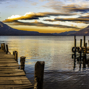 Private shuttle from Antigua to Lake Atitlan - Panajachel dock at sunset with volcano views